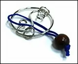 Головоломка металлическая розовая (002498)